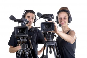young man and young woman with camera